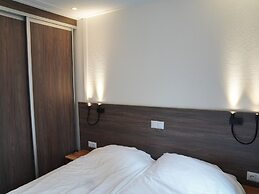 Beautiful Chalet With a Fireplace in a Wooded Area