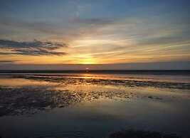 Sun, Mudflats and sea