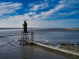 Sun, Mudflats and sea