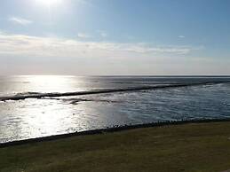Sun, Mudflats and sea