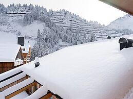 Apartment in Schrocken Near ski Area