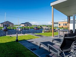 Beautiful Chalet With a Jetty, Near Frisian Lakes