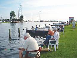 Beautiful Chalet With a Jetty, Near Frisian Lakes