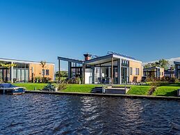 Beautiful Chalet With a Jetty, Near Frisian Lakes