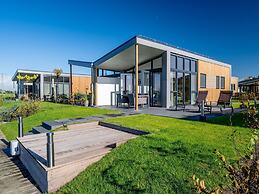 Beautiful Chalet With a Jetty, Near Frisian Lakes
