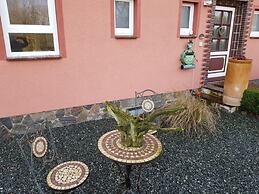 Swallow's Nest in the House by the Pond