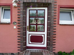Swallow's Nest in the House by the Pond
