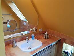 Swallow's Nest in the House by the Pond