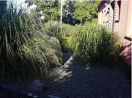 Swallow's Nest in the House by the Pond