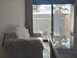 Belvilla by OYO Apartamento con Patio