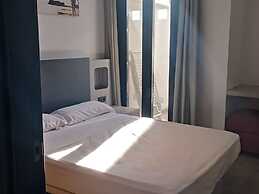 Belvilla by OYO Apartamento con Patio