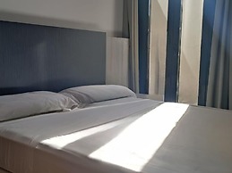 Belvilla by OYO Apartamento con Patio