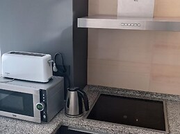 Belvilla by OYO Apartamento con Patio