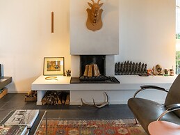Cozy Forest Villa on the Water Near Harderwijk