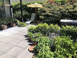 Cozy Forest Villa on the Water Near Harderwijk