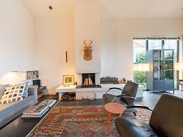 Cozy Forest Villa on the Water Near Harderwijk