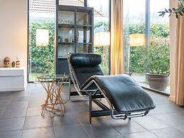 Cozy Forest Villa on the Water Near Harderwijk