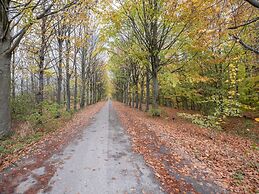 Cozy Forest Villa on the Water Near Harderwijk