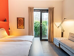 Cozy Forest Villa on the Water Near Harderwijk