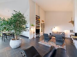Cozy Forest Villa on the Water Near Harderwijk