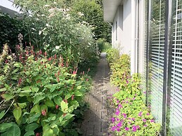 Cozy Forest Villa on the Water Near Harderwijk