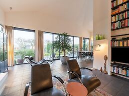 Cozy Forest Villa on the Water Near Harderwijk