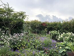 Cozy Forest Villa on the Water Near Harderwijk