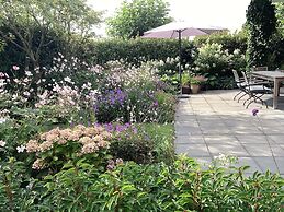 Cozy Forest Villa on the Water Near Harderwijk