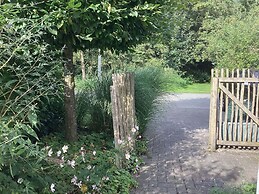 Cozy Forest Villa on the Water Near Harderwijk