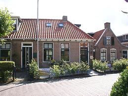 Atmospheric Wadden Houses Next to Eachother