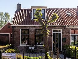 Atmospheric Wadden Houses Next to Eachother