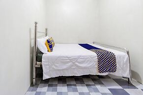 SPOT ON 93967 Hasna Guest House Syariah