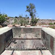 Villetta Paduli - Immersa nel Verde con Vista Mare e Giardino Privato