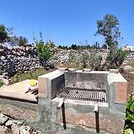 Villetta Paduli - Immersa nel Verde con Vista Mare e Giardino Privato