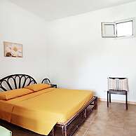 Villetta Paduli - Immersa nel Verde con Vista Mare e Giardino Privato