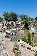 Villetta Paduli - Immersa nel Verde con Vista Mare e Giardino Privato