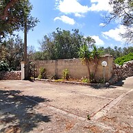 Villetta Paduli - Immersa nel Verde con Vista Mare e Giardino Privato