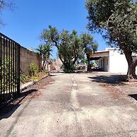 Villetta Paduli - Immersa nel Verde con Vista Mare e Giardino Privato