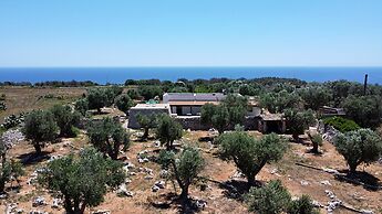 Villetta Paduli - Immersa nel Verde con Vista Mare e Giardino Privato