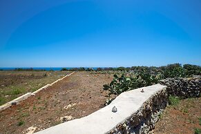 Villetta Paduli - Immersa nel Verde con Vista Mare e Giardino Privato