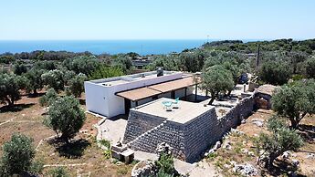 Villetta Paduli - Immersa nel Verde con Vista Mare e Giardino Privato