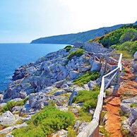 Villetta Paduli - Immersa nel Verde con Vista Mare e Giardino Privato