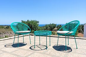 Villetta Paduli - Immersa nel Verde con Vista Mare e Giardino Privato