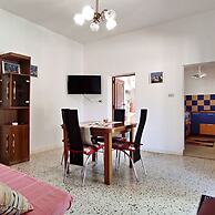 Villetta Paduli - Immersa nel Verde con Vista Mare e Giardino Privato