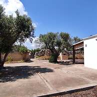 Villetta Paduli - Immersa nel Verde con Vista Mare e Giardino Privato