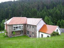 Gite Hansel, set in Greenery Beside a Stream