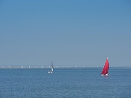 Modern Chalet on the Water at a Holiday Park