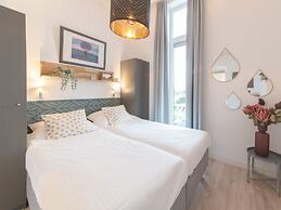 Modern Chalet on the Water at a Holiday Park