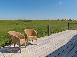 Chalet With Decorative Fireplace on a Holiday Park