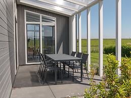 Chalet With Decorative Fireplace on a Holiday Park